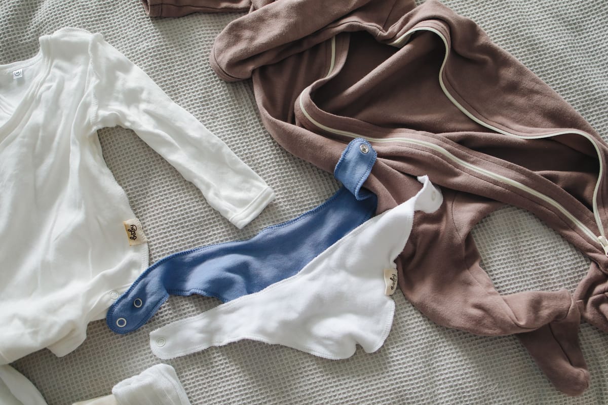 Kinderkleding met groeimouwen: langer dragen, minder uitgeven